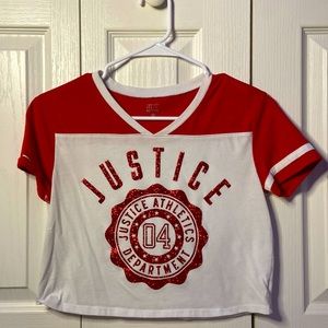 Girls Justice red and white cropped shirt.